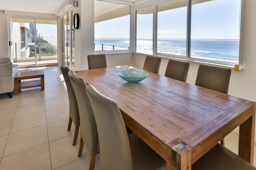 Open plan dining with beachfront view apartment 13